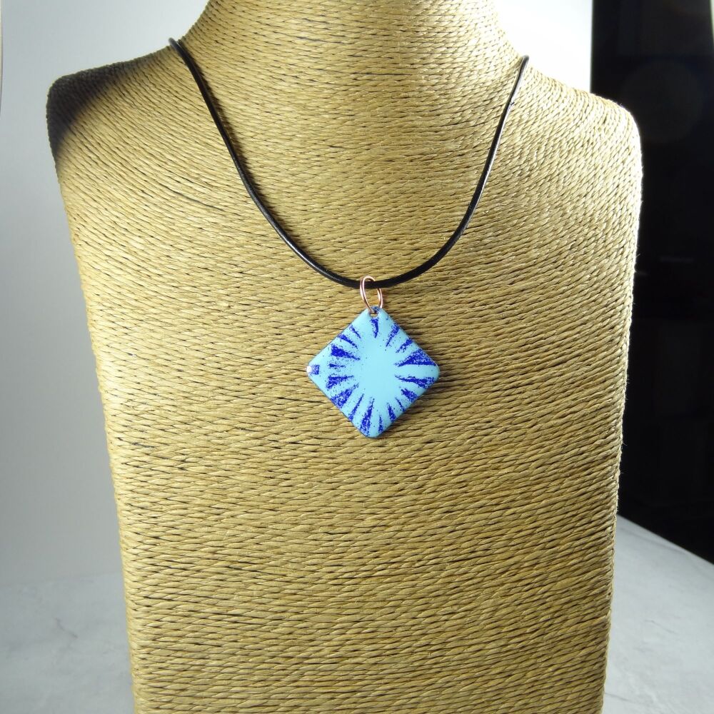Handcrafted blue glass enamelled copper rhombus shaped 25mm pendant, on an 18 inch black leather cord with lobster clasp (#0105)