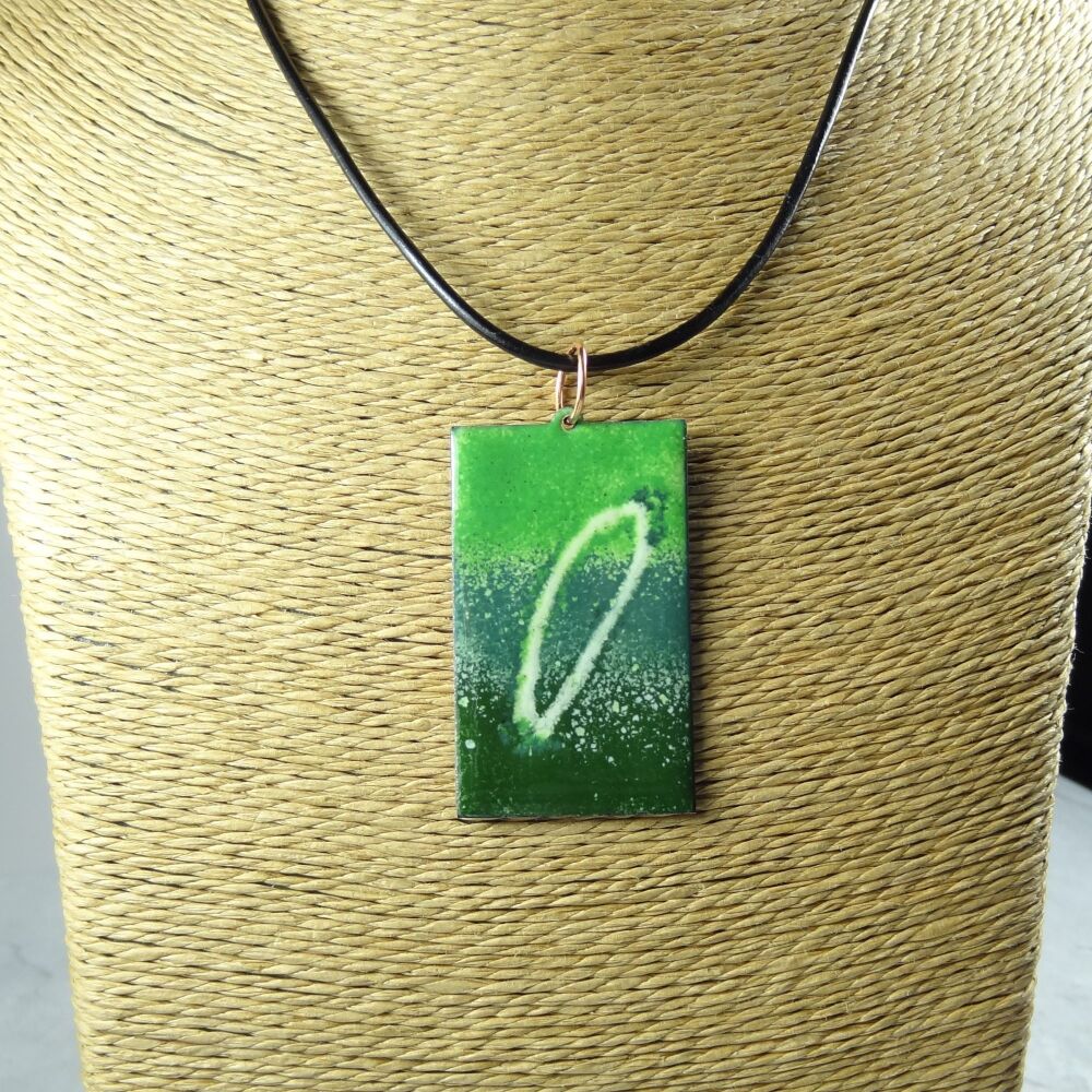 Handcrafted green glass enamelled copper rectangular shaped 47x29mm pendant, on an 18 inch black leather cord with lobster clasp (#0117)