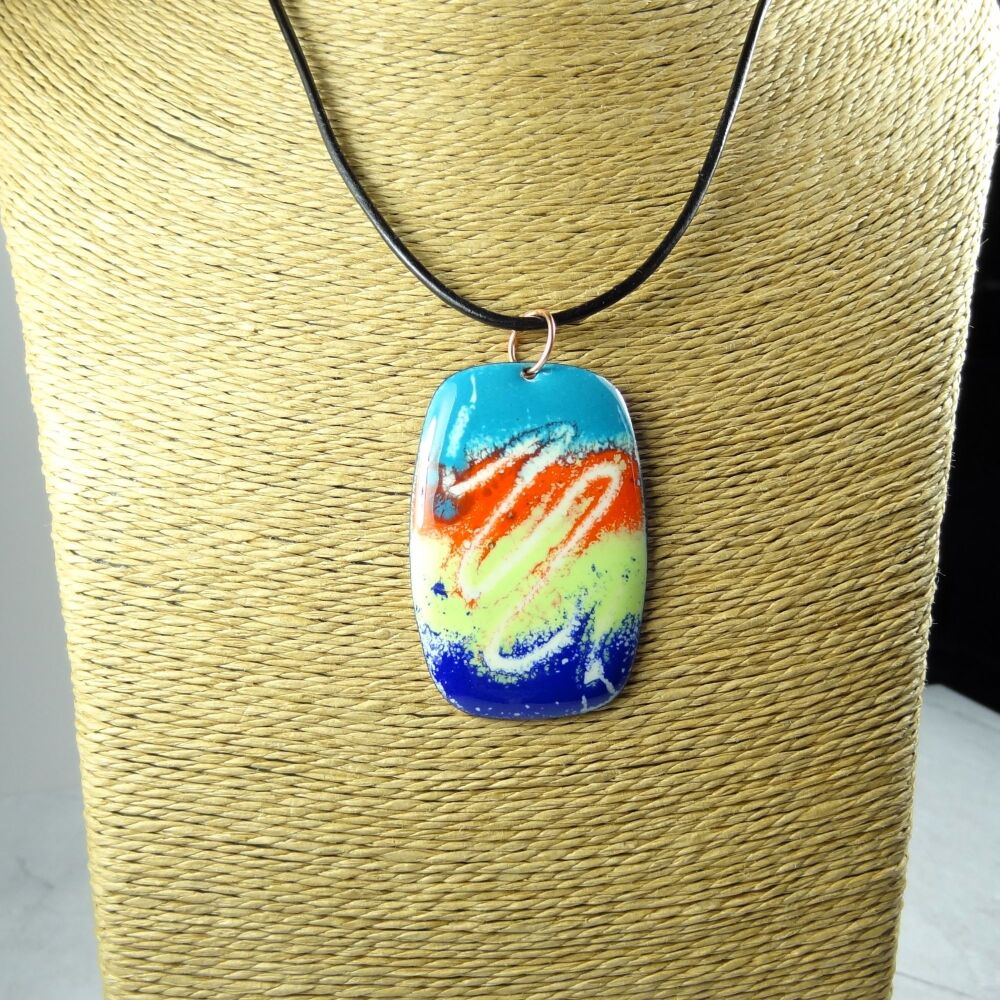 Handcrafted blue orange yellow dark blue glass enamelled copper 51x34mm pendant, on an 18 inch black leather cord with lobster clasp (#0078)