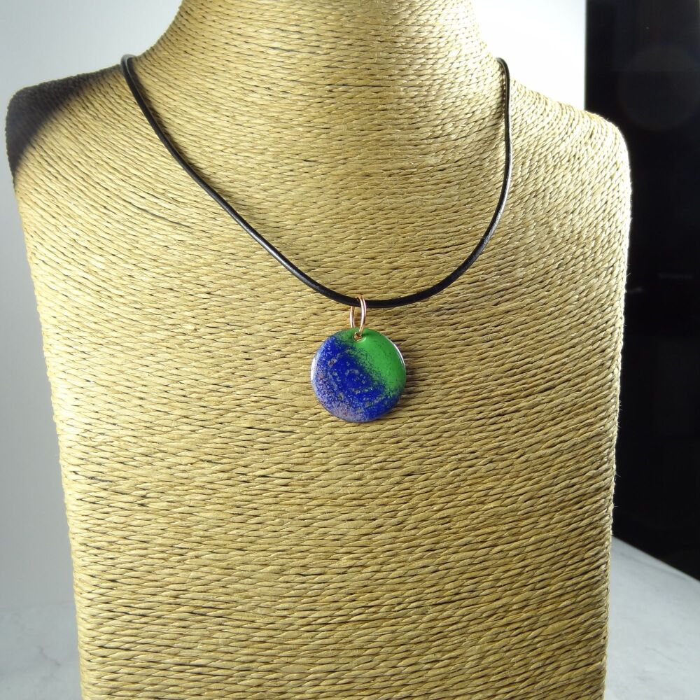 Handcrafted pink blue green glass enamelled copper 22mm disc pendant, on an 18 inch black leather cord with lobster clasp (#0112)