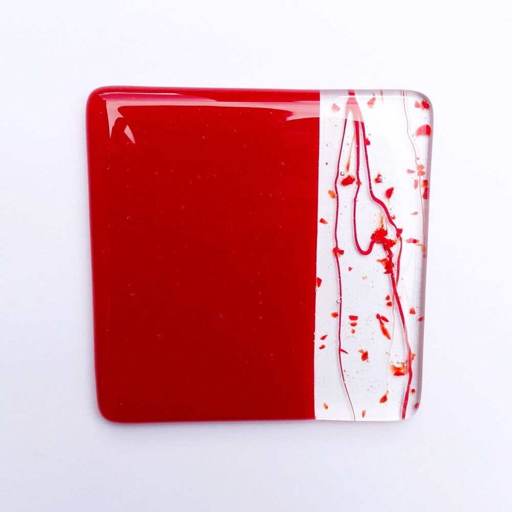 Handcrafted fused glass red collage coaster, with bumper feet, 9cm