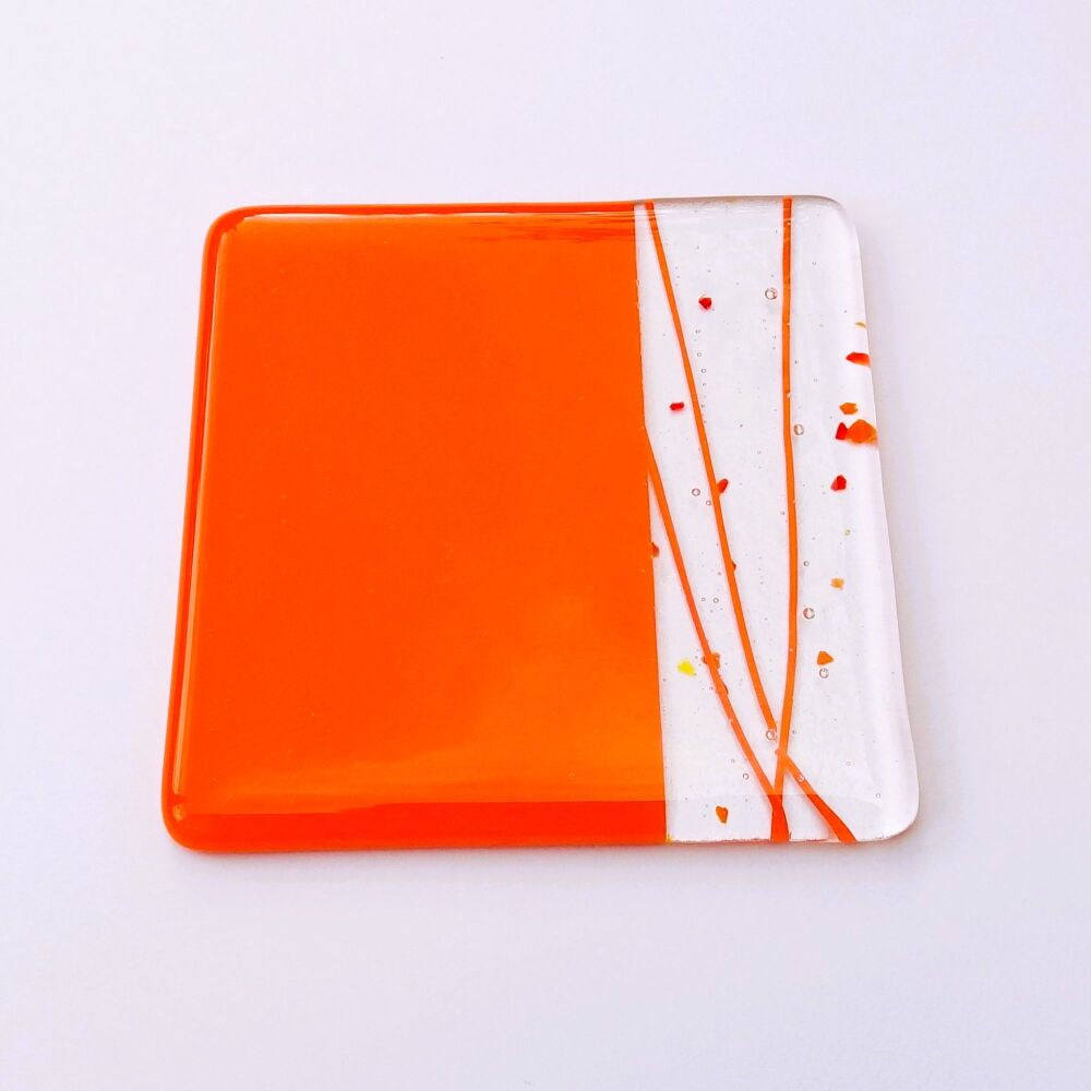 Handcrafted fused glass orange collage coaster, with bumper feet, 9cm (#0119)