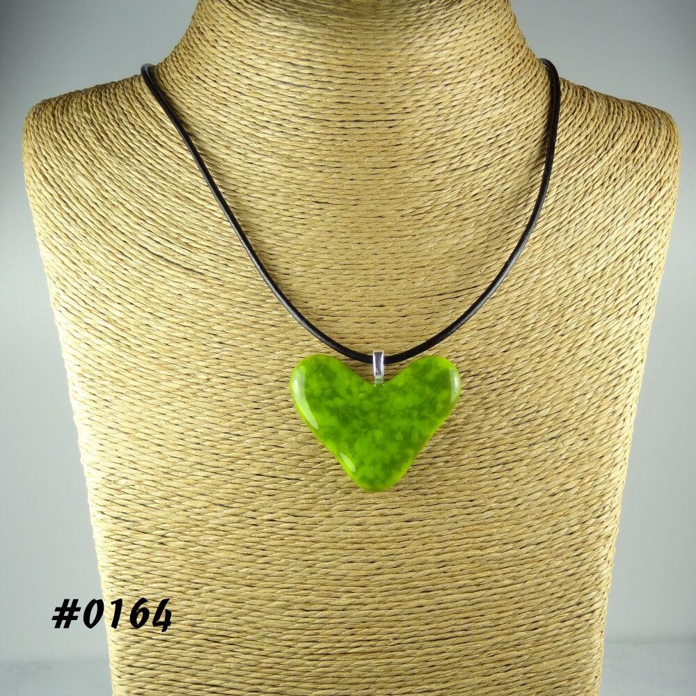 Green handcrafted fused glass heart shaped pendant on a black leather cord with lobster clasp (#0164)