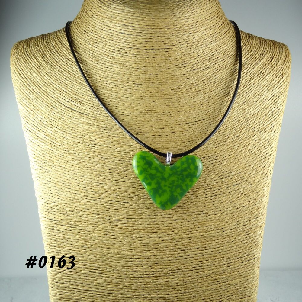 Green handcrafted fused glass heart shaped pendant on a black leather cord with lobster clasp (#0163)