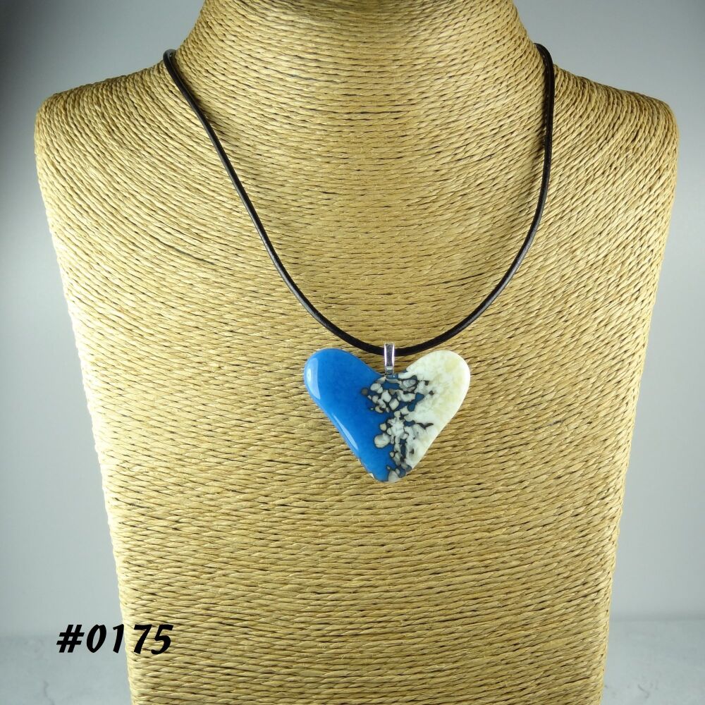 Blue cream handcrafted fused glass heart shaped pendant on a black leather cord with lobster clasp (#0175)