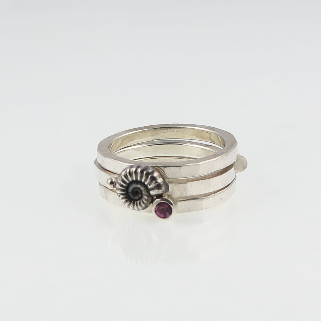 Ammonite stacking ring set with garnet