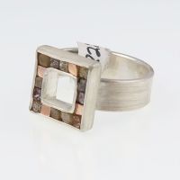 Rough diamond cube and red gold cubist ring