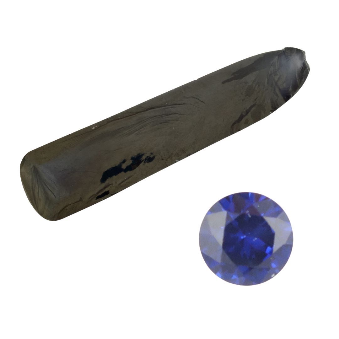 Blue synthetic sapphire boule and faceted stone
