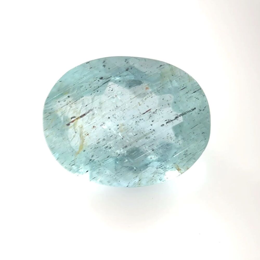 Aquamarine with limonite-lined growth tubes - 1992
