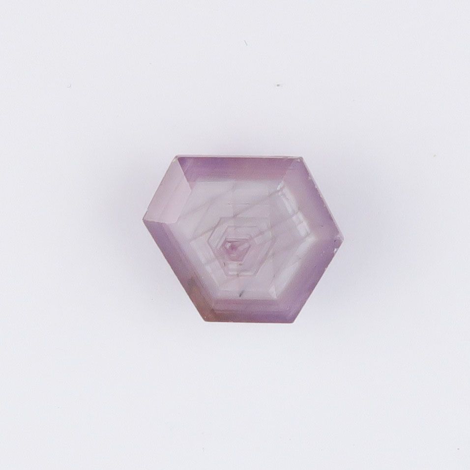 Sapphire faceted with pink sheen & growth pattern - 2934