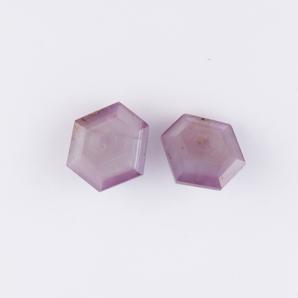 Sapphire faceted pair with pink sheen & growth pattern - 2933