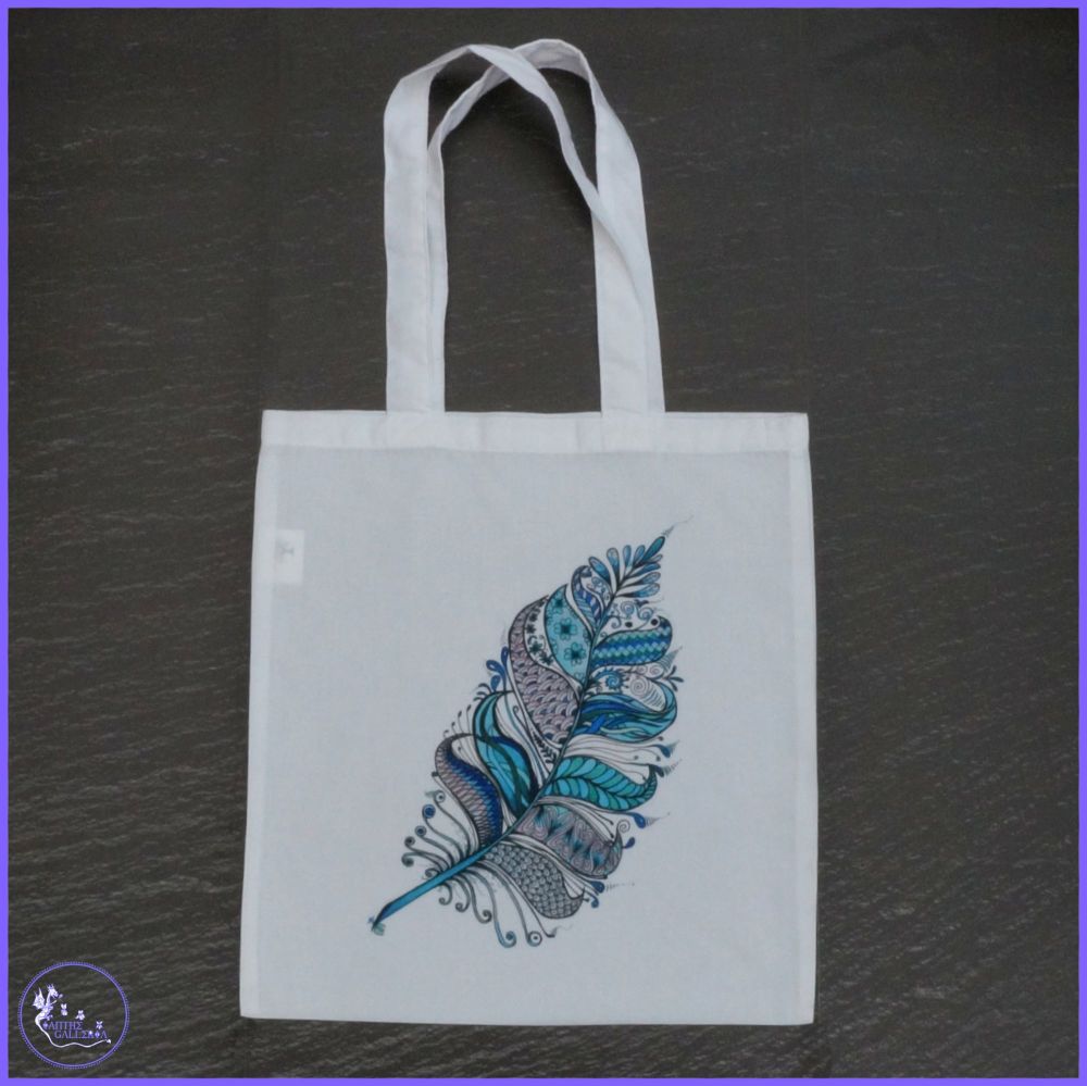 Feathers in Blue Tote Bag.