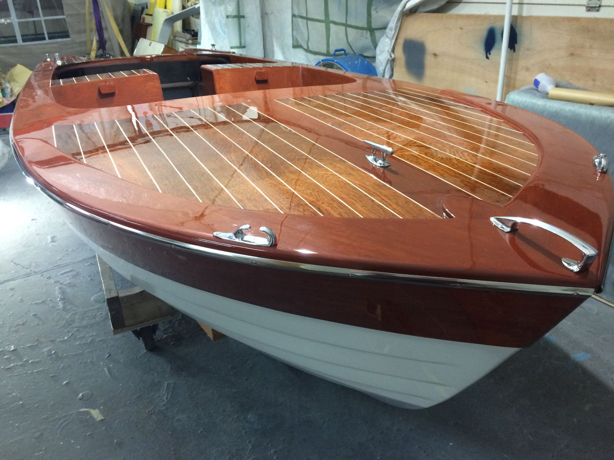 marine gloss varnish on a broom viking at fine wooden boats workshop