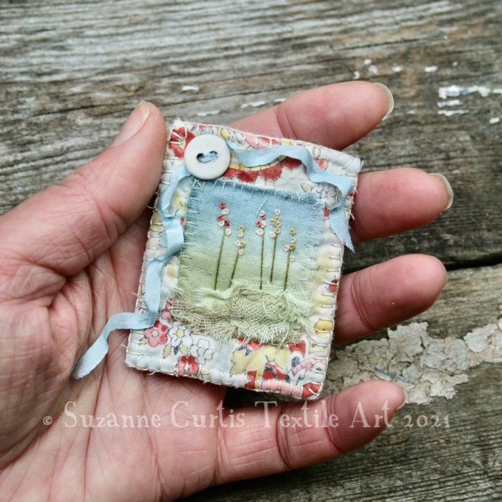 Embroidered vintage textile brooch