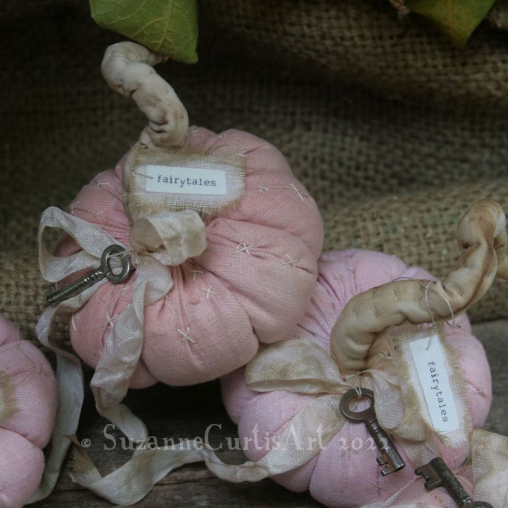 Hand dyed linen pumpkins in soft russet pinks