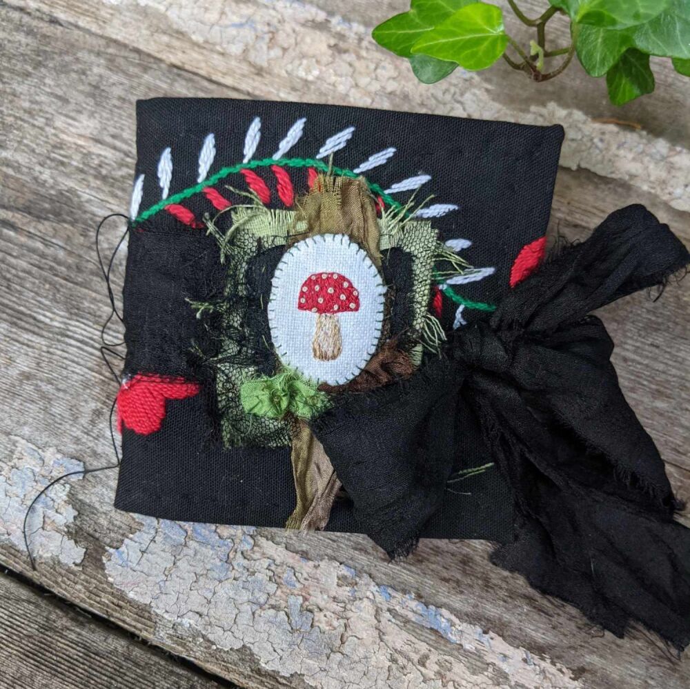 Toadstool needlebook black 5