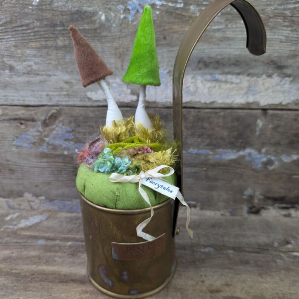 Two Velvet Toadstools in a Vintage Brass Measure