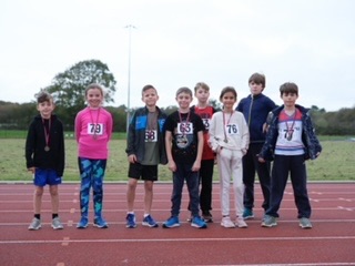 U11 mile athletes with medals