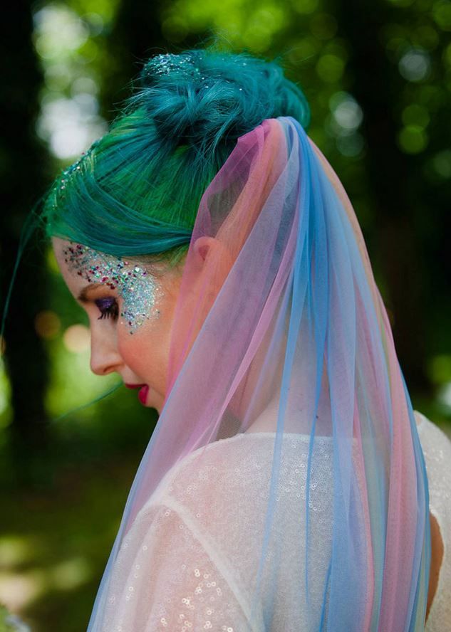 festival bride with space buns and glitter