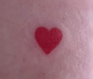 Rachel's heart tattoo