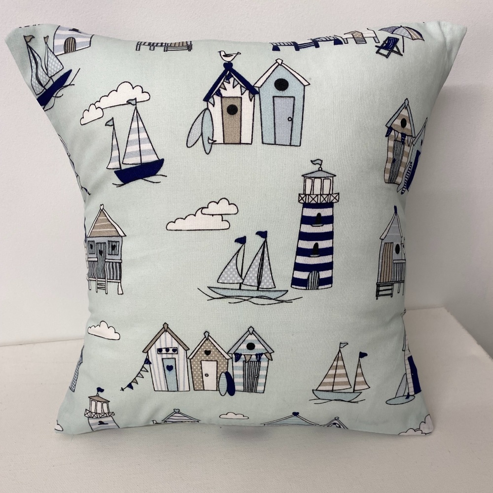 Beach hut & light house cushion - baby blue 