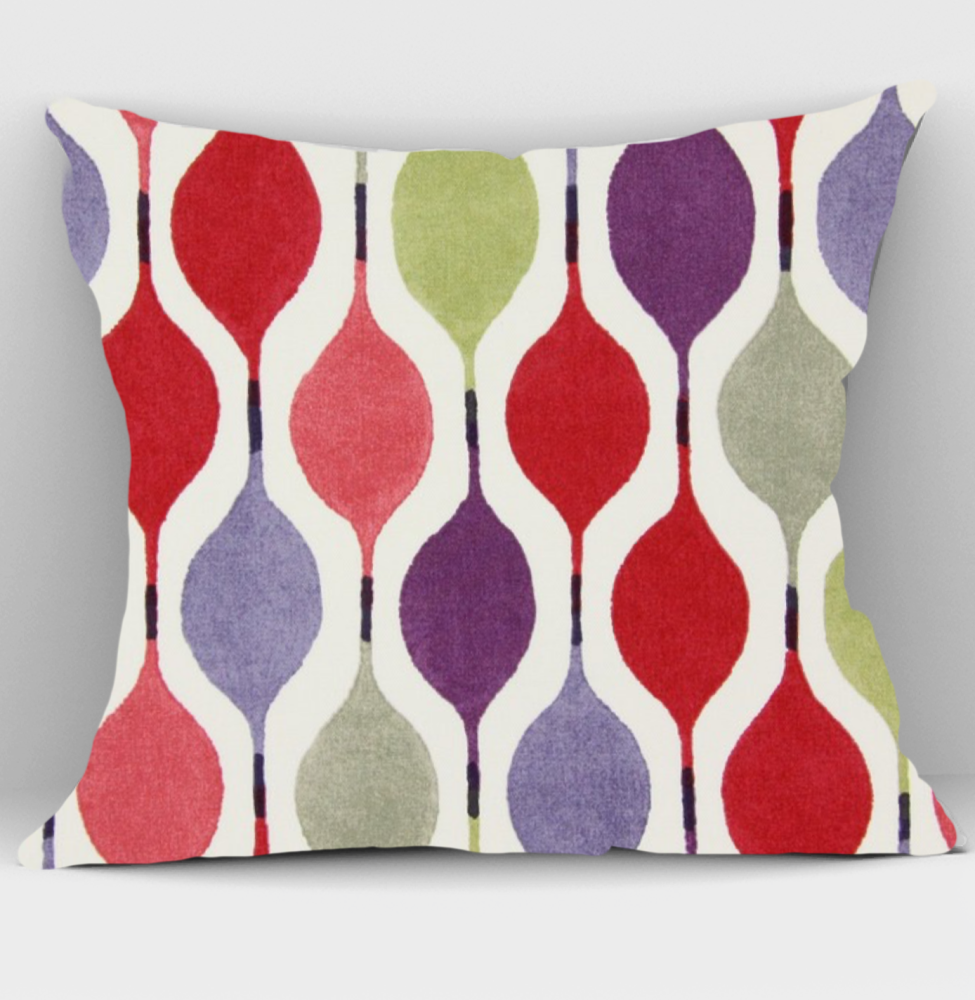 Geometric cushions in Verve Berry