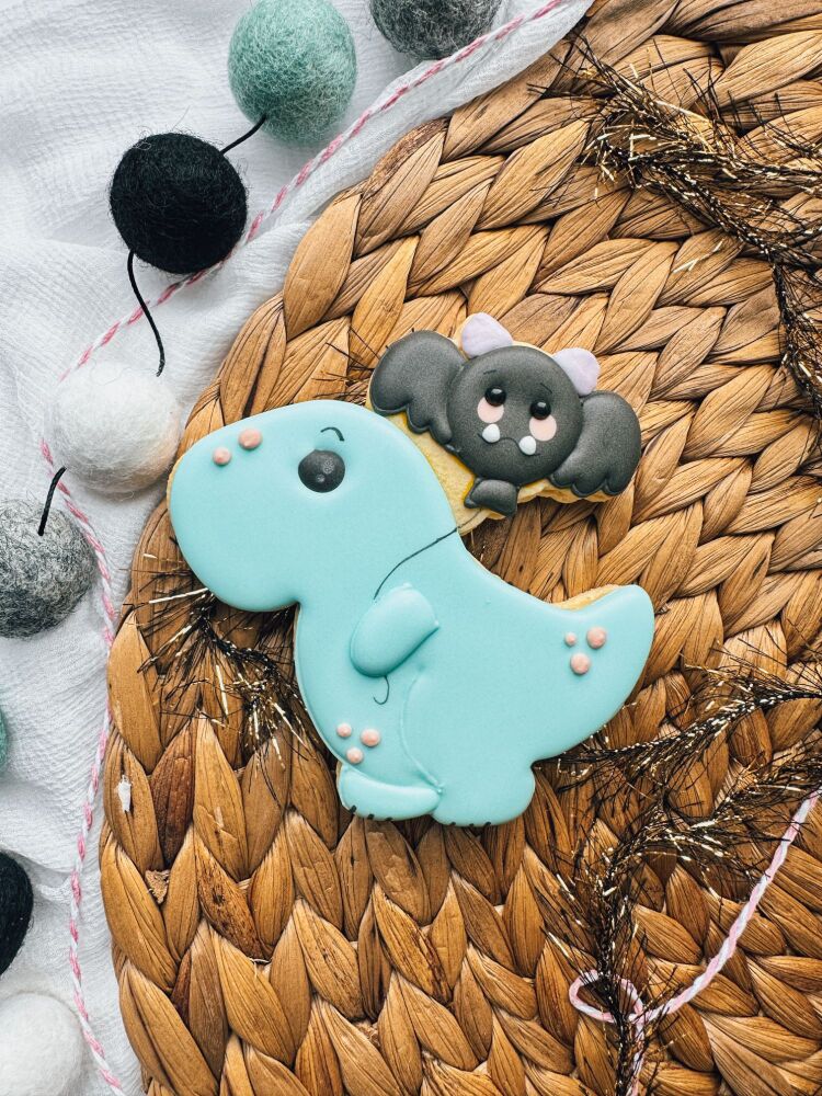 Dinosaur with balloon cookie