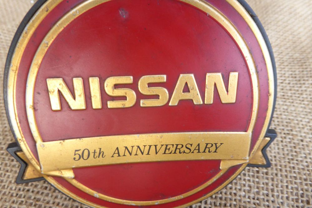 Nissan 50th Anniversary Car Badge - Original