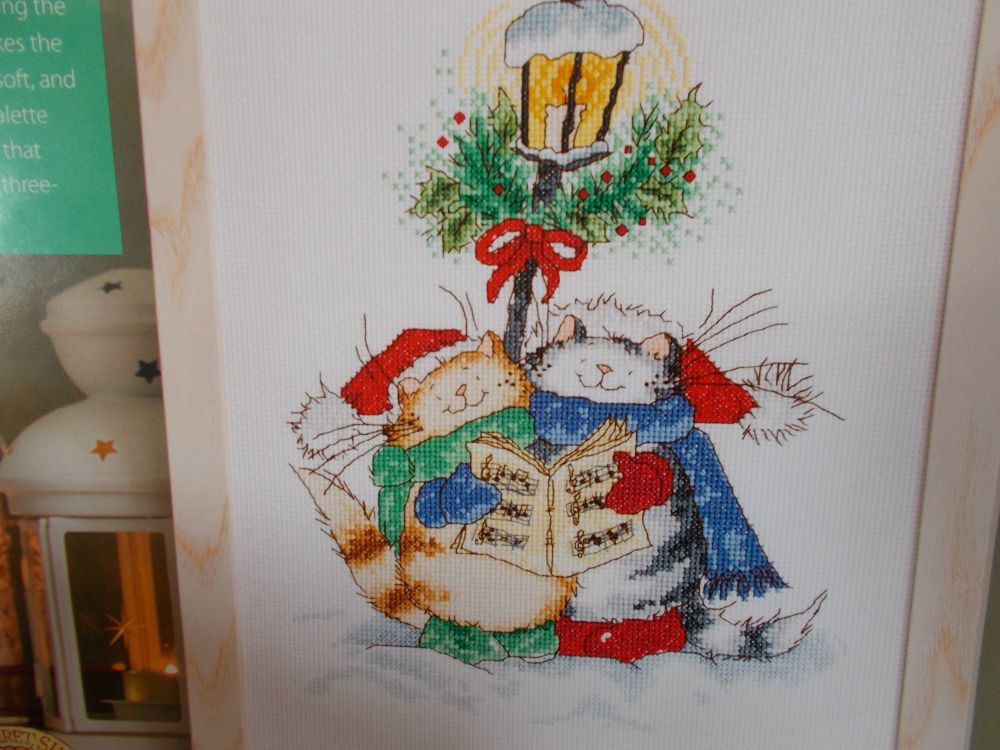 Carolling cats chart by Margaret Sherry