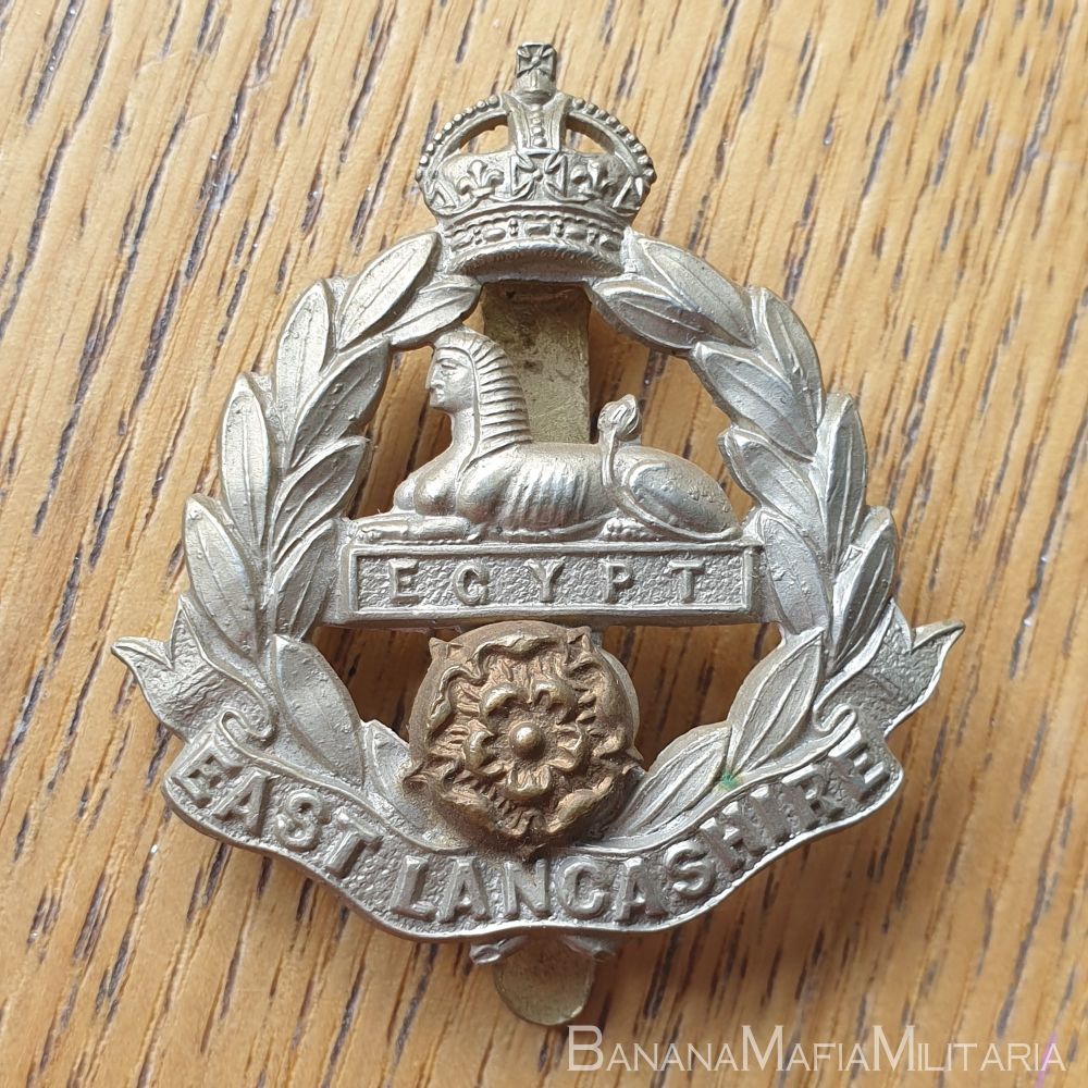 British East Lancashire  Regiment bi-metal Cap Badge on slider