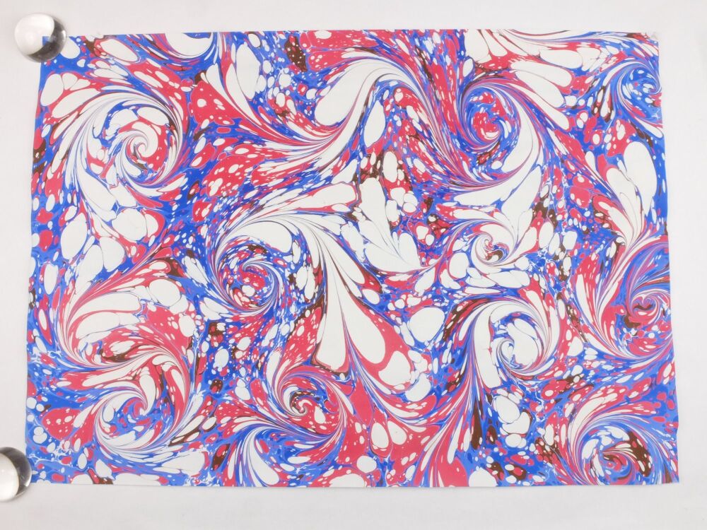 Red, blue, brown and cream drawn stone pattern marbled A2 paper design