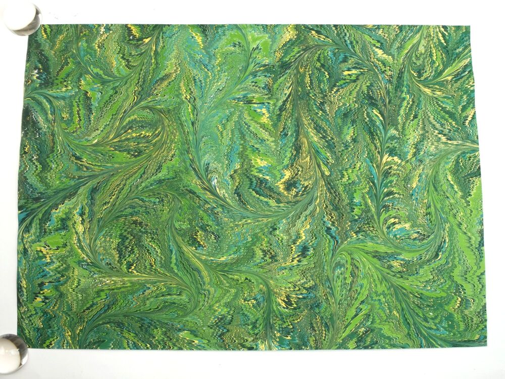 Greens and gold drawn nonpareil pattern marbled A2 paper design