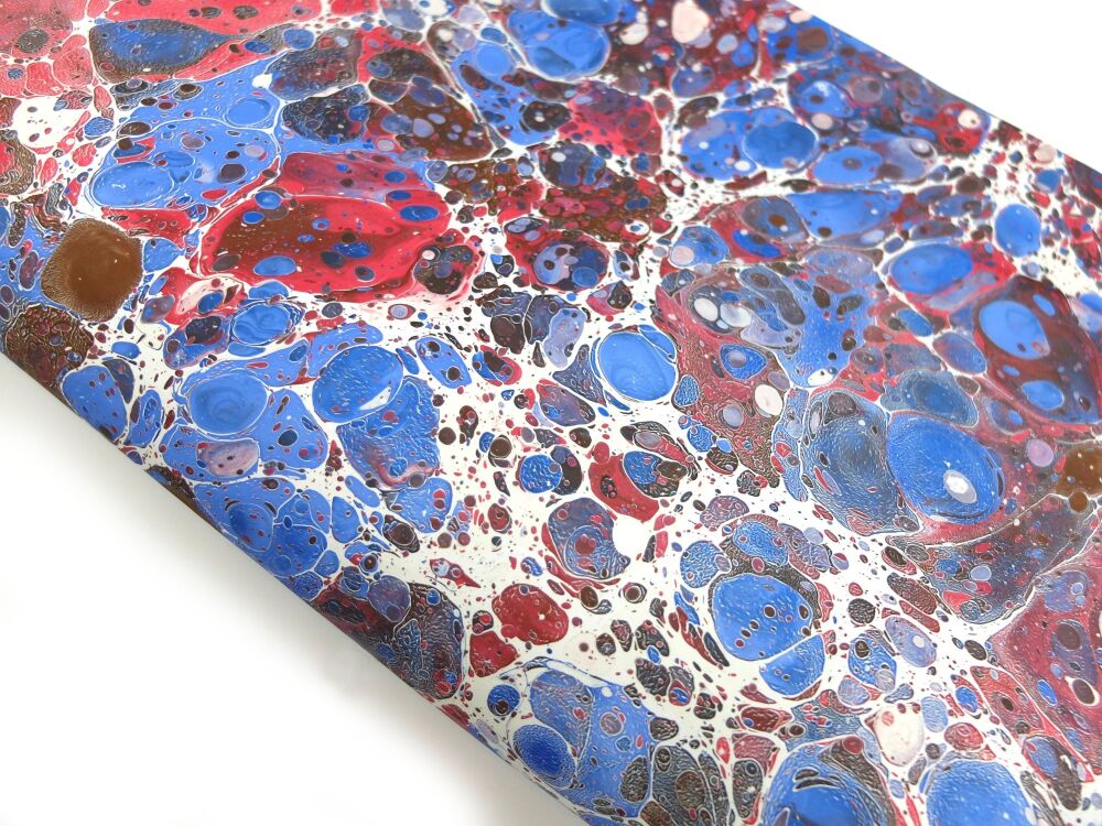 Crimson, cream, brown and blue stone pattern 'Lapidarium III' marbled A2 paper design