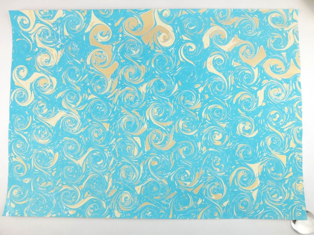 Turquoise, cream, and gold French curl pattern marbled A2 paper design