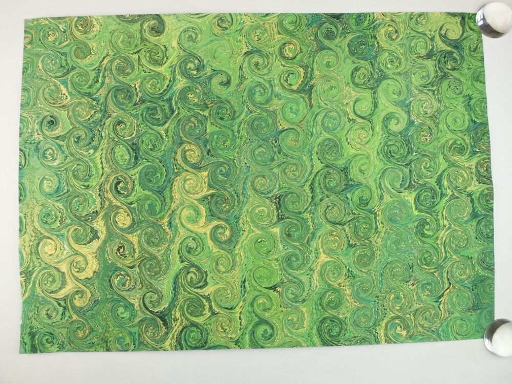 Greens and gold French curl pattern marbled A2 paper design