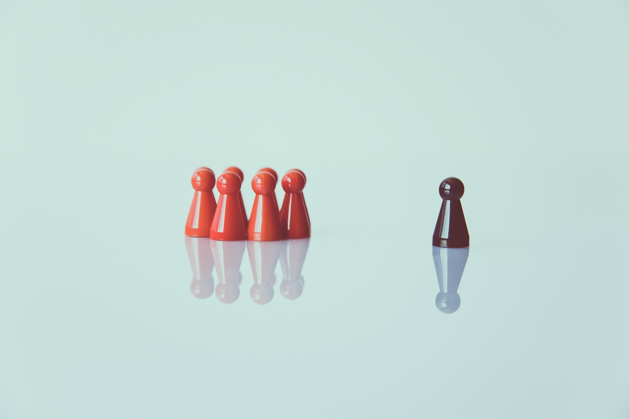 Image of game pieces representing leadership