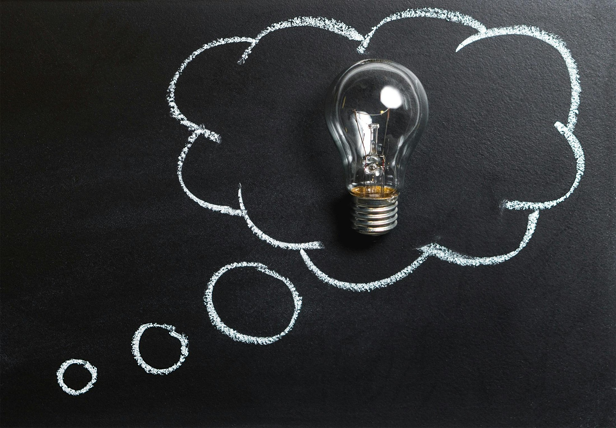 Image of a lightbulb inside a thought bubble