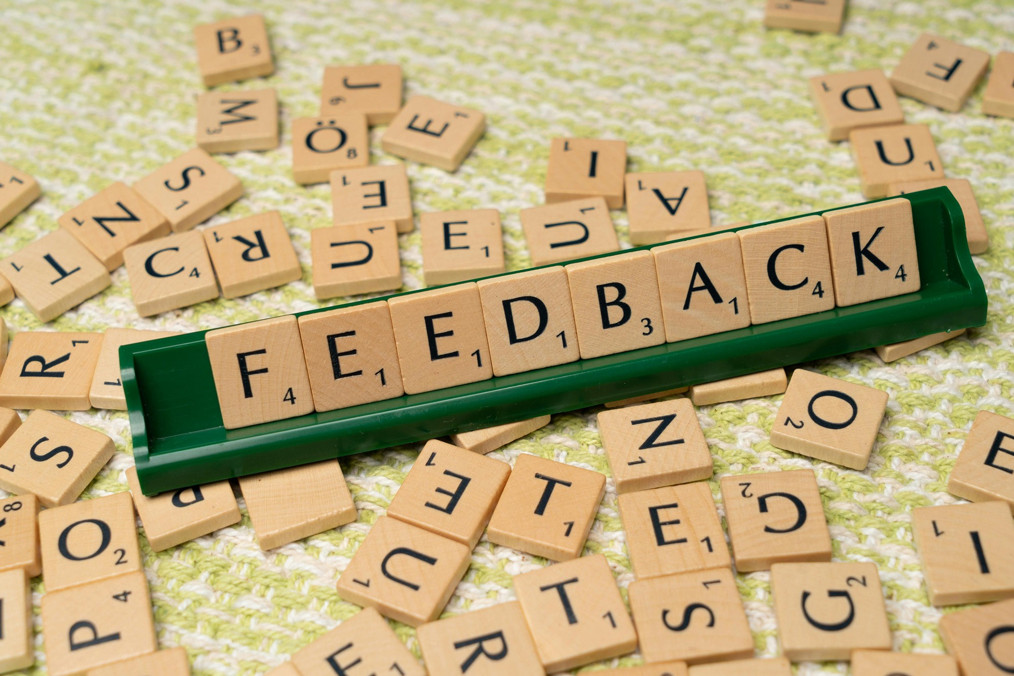 scrabble tiles spelling out feedback