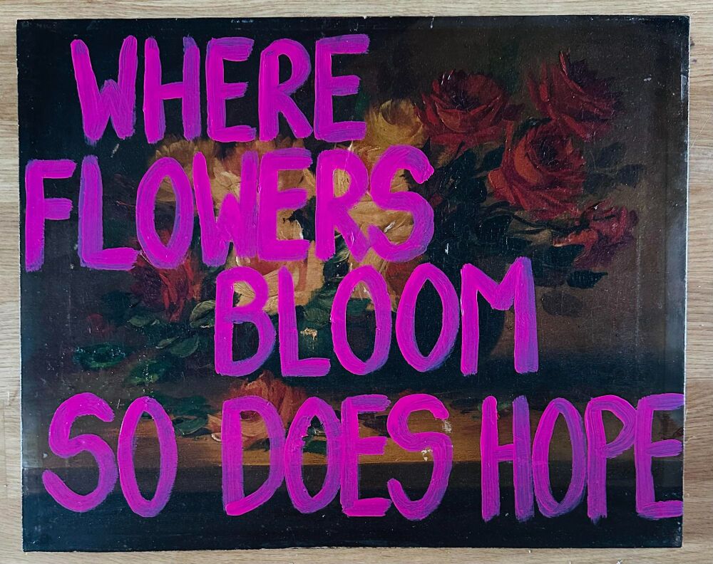 WHERE FLOWERS BLOOM SO DOES HOPE