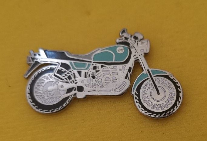 R100R lapel pin badge (0144)..