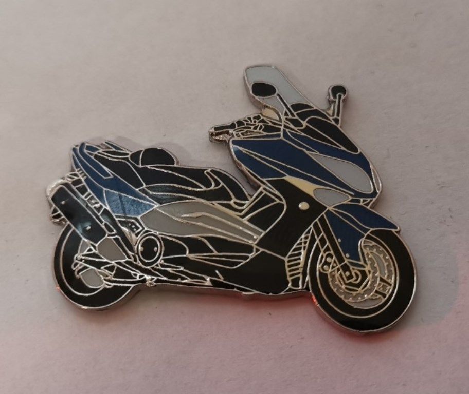 T Max lapel pin badge (1086)..