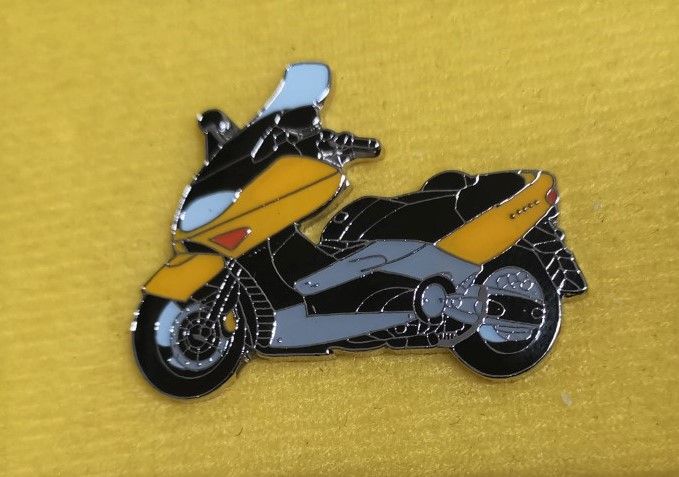 T Max lapel pin badge (0802)..
