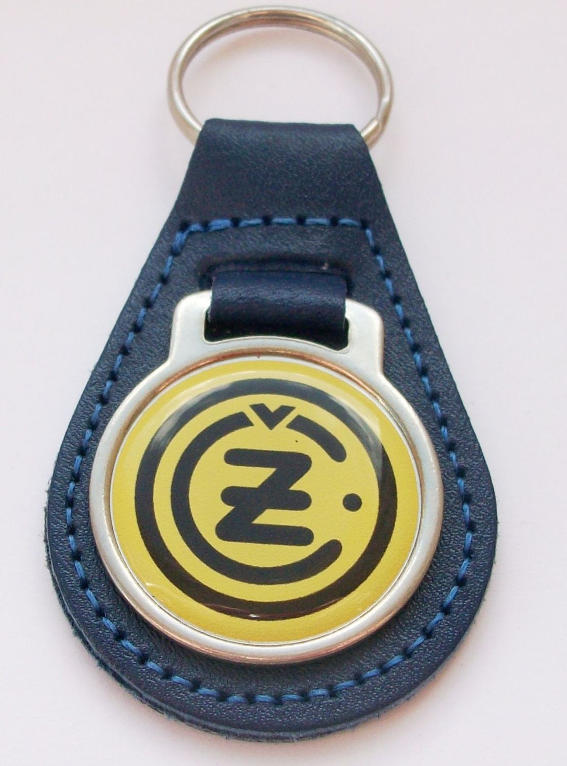 CZ acrylic badged blue leather keyring