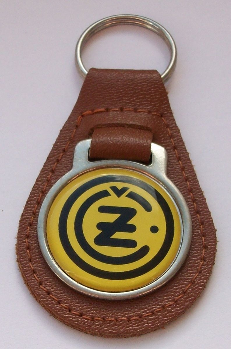 CZ acrylic badged tan leather keyring.