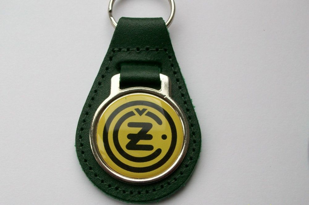 CZ acrylic badged green leather keyring..