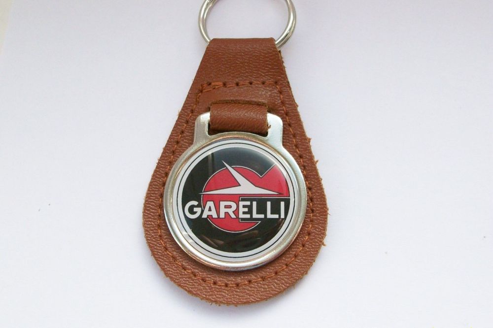 Garelli acrylic badged tan leather keyring..