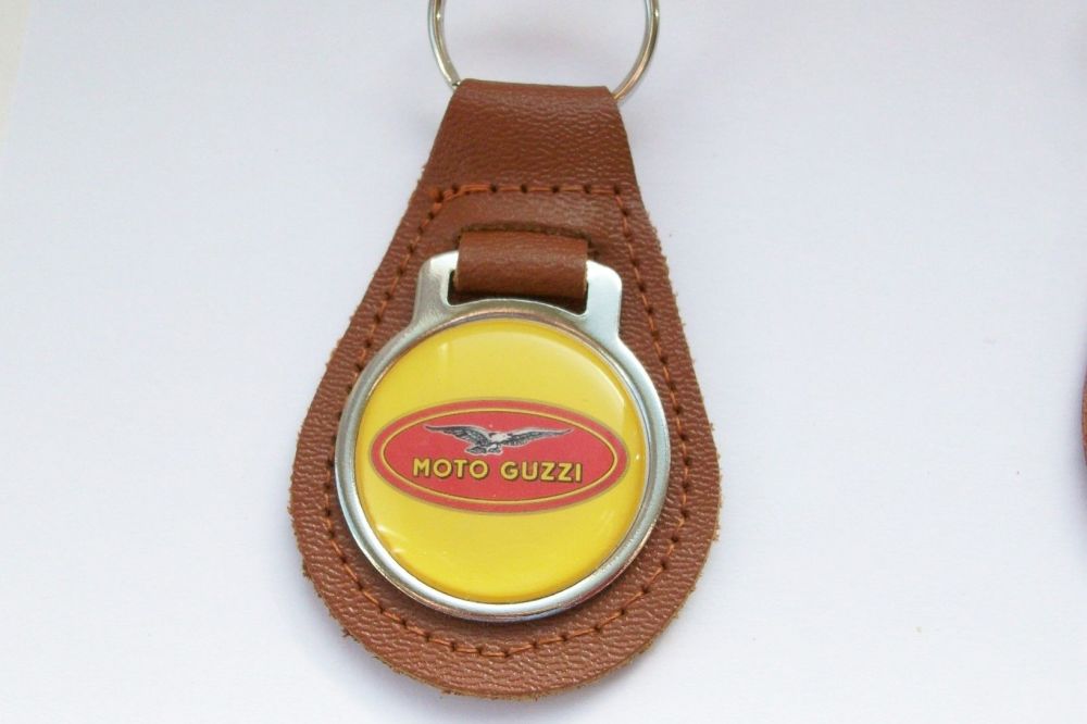 Moto Guzzi acrylic badged tan leather keyring..