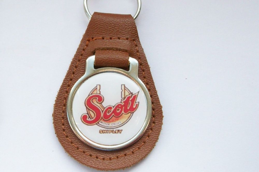 Scott acrylic badged tan leather keyring..