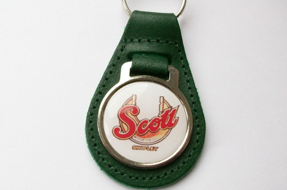 Scott acrylic badged green leather keyring..