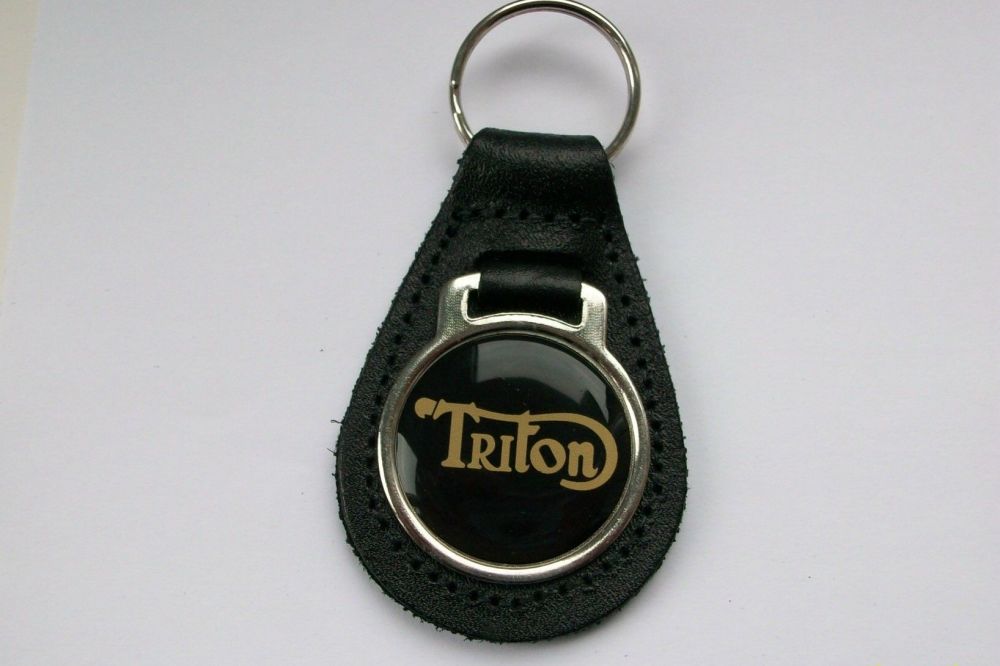 Triton acrylic badged black leather keyring..